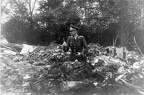 Same German officer in rubbish after the crash
